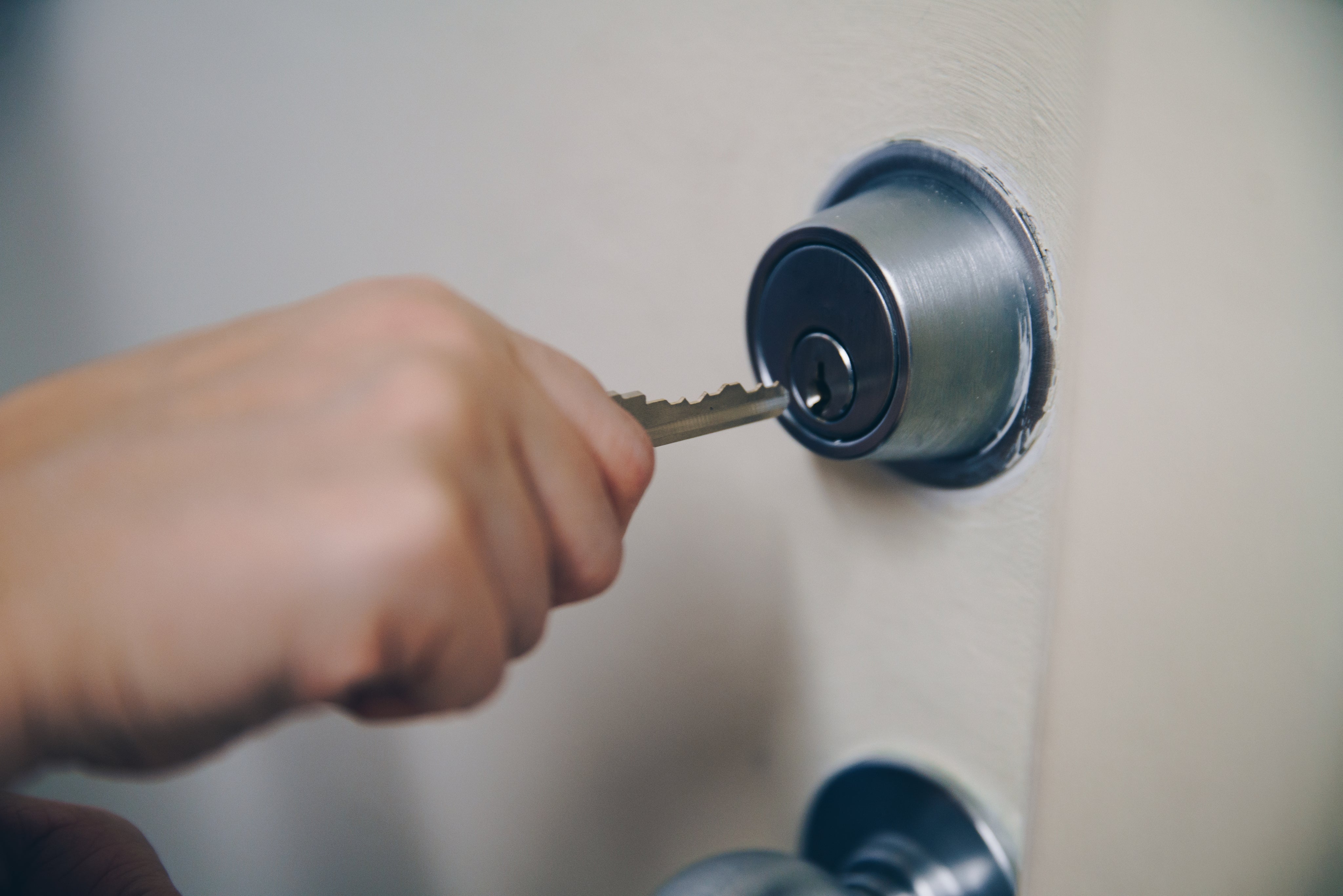 key-in-hand-unlocking-door.jpg?v=1686229865\u0026width=1500